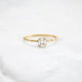 golden-lace-round-cut-pave-moissanite-engagement-ring-0.5-ct-yellow-gold-gemfora-1